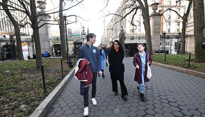 Student tour guides take Minouche Shafik around the Morningside campus