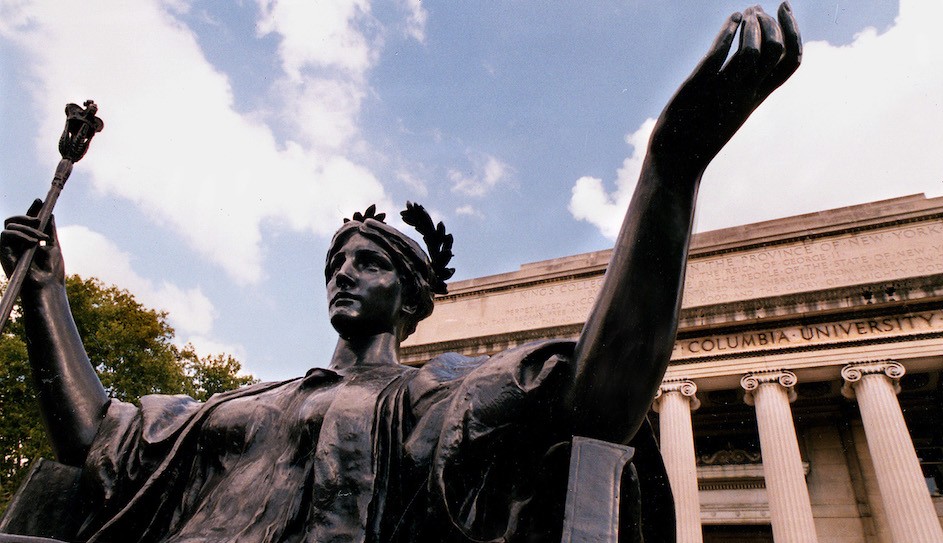 Statue of Alma Mater with Columbia's Low Library in the background.