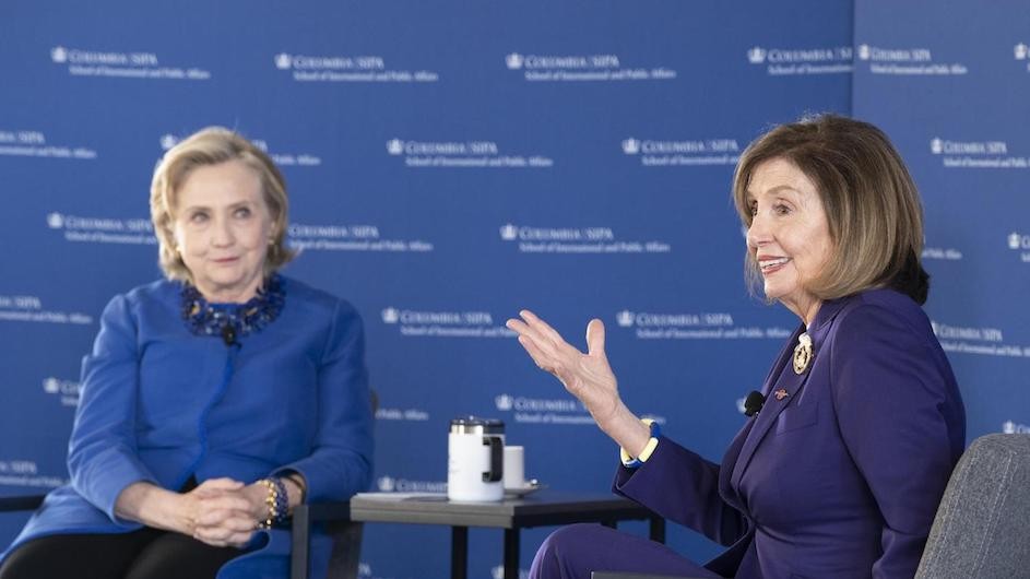 Hillary Clinton and Nancy Pelosi in conversation