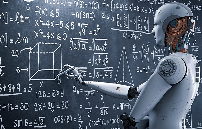 A robot writes formulas on the a blackboard.