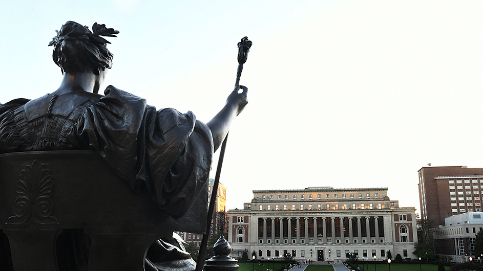 Alma Mater looks out on Butler Library.