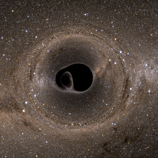 A computer rendering of two black holes that are about to merge, as viewed from the side. (Credit: SXS Lensing/Simulating eXtreme Spacetimes Collaboration)
