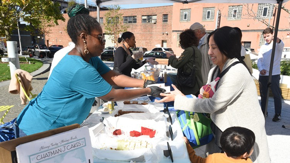 Chatman J Cakes shares cakes with the local community at Manhattanville Community Day