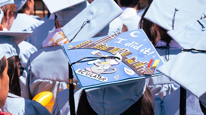#CULater, Columbia grads! Photo by Sirin Samman. A mortar board that reads "I did it! #CULater."