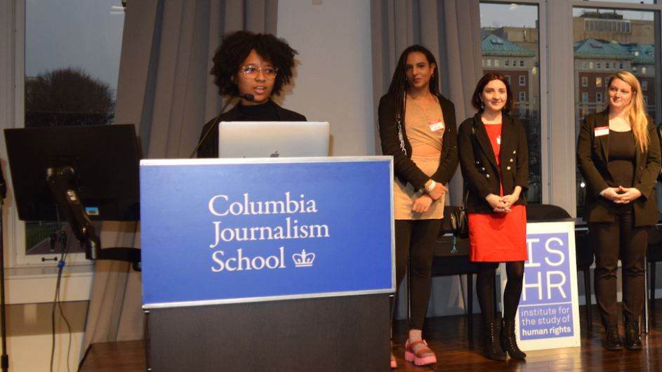 Four of the 2022-2023 Human Rights Advocates Program cohort members: (l to r) Jade Jacobs-Wort, South Africa; Antonia Moreira, Brazil; Marine Kapanadze, Georgia; and Jelena Hrnjak, Serbia. Institute for the Study of Human Rights reception at Columbia University. One person is speaking at a podium and three others are standing behind them.