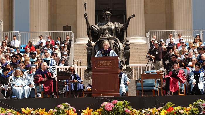 A row of flowers in front of Bollinge giving a speech by Alma Mater.