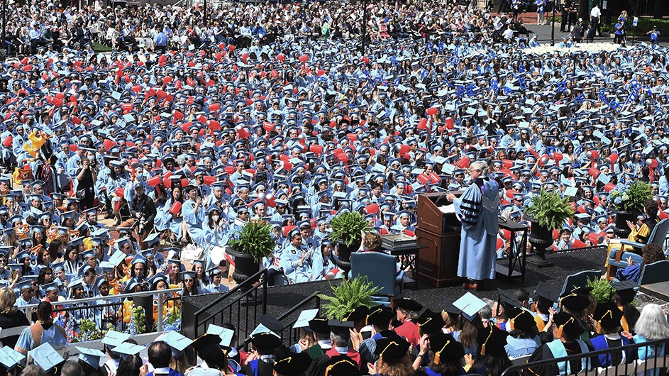 Photo by Eileen Barroso. President Bollinger addresses the Commencement crowd in 2022.
