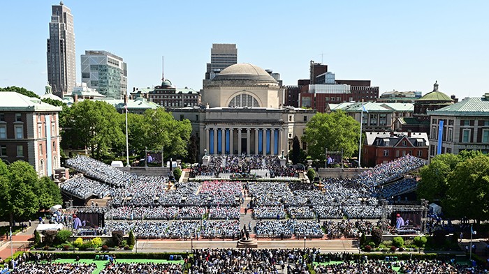 It was a perfect day for outdoor Commencement on Morningside campus, a nearly 100-year-old tradition. Photo by Chris Taggart. An aerial of Commencement looking over Low Library.