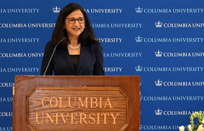 Minouche Shafik speaks at a Columbia podium. 