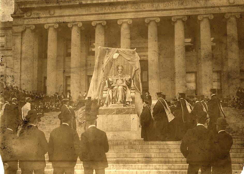 1903 photo of Alma Mater statue unveiling ceremony with dozens of attendees in front of Low Library at Columbia University. 