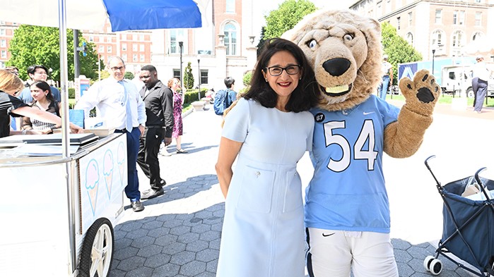 President Minouche Shafik welcomed students back to campus with ice cream trucks on College Walk on the first day of classes. It was a warm day and the ice cream was the perfect treat to kick off the fall semester. Photo by Eileen Barroso. President Shafik poses with Roar-ee