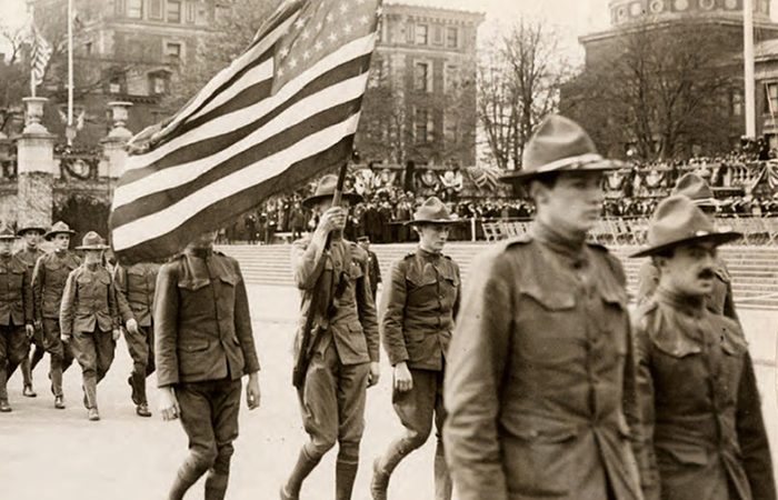 During World War I, soldiers perform an exercise on Columbia's campus. 
