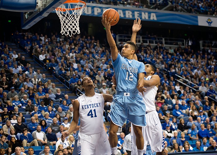 Maodo Lo, playing for Columbia Basketball. Courtesy Columbia University Athletics. Maodo Lo, playing basketball