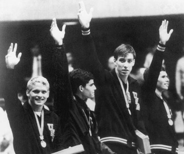 Steve Rerych, third from left, with Mark Spitz. Courtesy of North Carolina State Hall of Fame. Steve Rerych, third from left, with Mark Spitz.