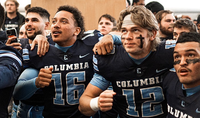 Columbia Football players wait in anticipation to see if they won the Ivy League title.