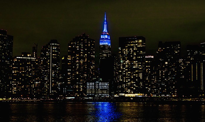 On Sunday night, the Empire State Building glowed blue in honor of Columbia Football's Ivy League Championship title. Photo by Stockton Photo/Columbia Athletics. The Empire State Building on November 24.