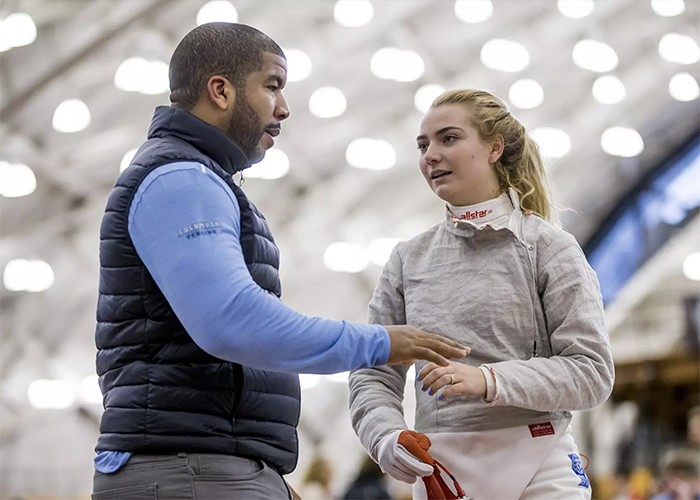 Akhnaten Spencer-El coaching a member of the Columbia fencing team. Courtesy Columbia Athletics. Akhi Spencer-El