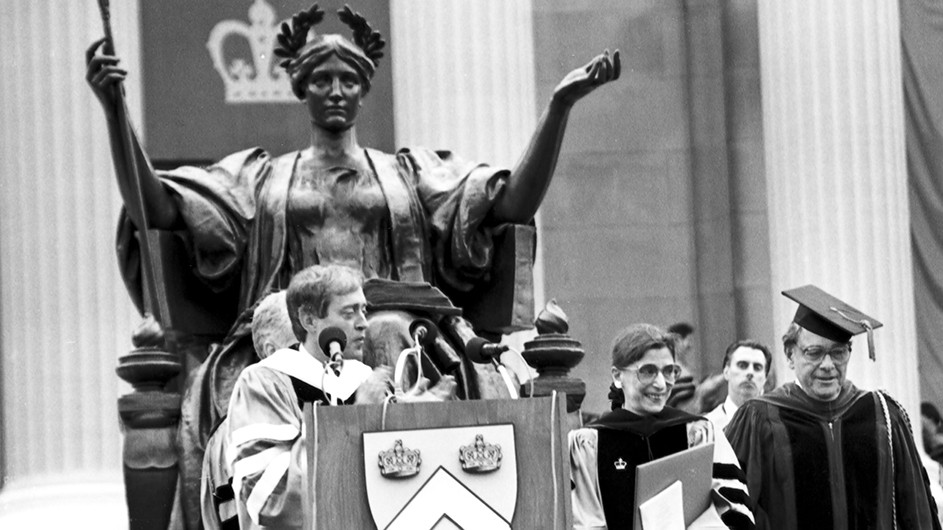 Justice Ruth Bader Ginsburg receiving a 1994 honorary degree from Columbia President Rupp in front of Alma Mater statue and Low Library at Columbia University.