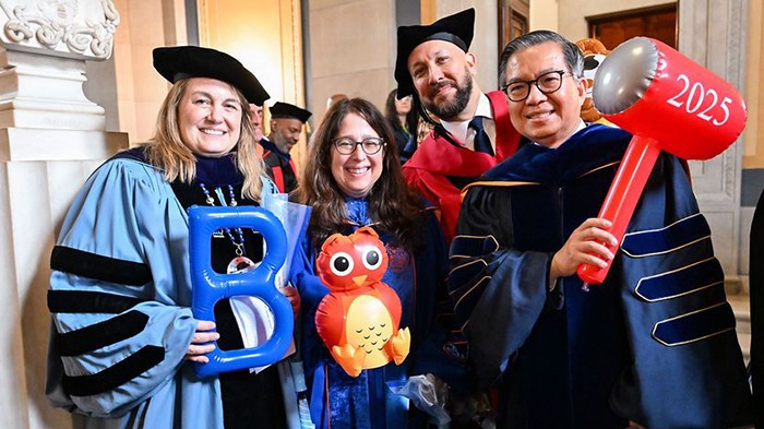 Barnard President Laura Rosenbury, School of General Studies Dean Lisa Rosen-Metsch, Columbia College Dean Josef Sorett, and Columbia Engineering Dean Shih-Fu Chang show off their school's inflatable icons before the start of Commencement. Photo by Diane Bondareff. The deans of Columbia's undergraduate schools flash their inflatable icons before the start of Commencement.