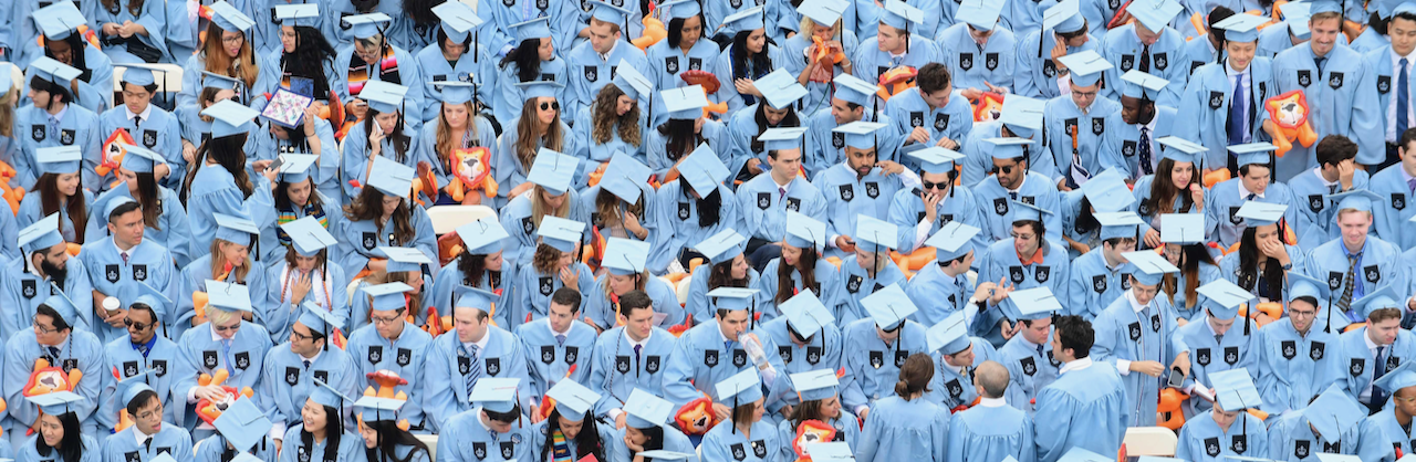 Wall to wall graduates in Columbia Blue at the University's Commencement 
