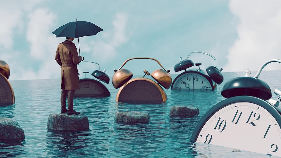 Artistic rendering of a person standing in water surrounded by large clocks.
