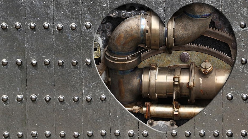 Illustration of metal pipes in the shape of a heart.