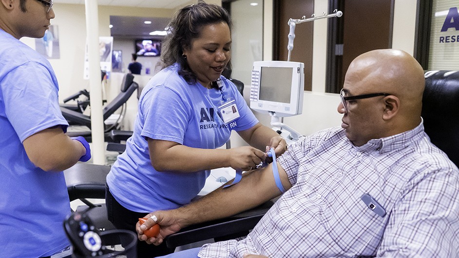 A participant enrolls in the All of Us Research program. The NIH-funded initiative aims to create the most diverse genetic database in the nation. Photo courtesy of National Institutes of Health A participant has his blood drawn to enroll in the All of Us Research program, a National Institute of Health initiative that aims to create a more diverse genetic databank.