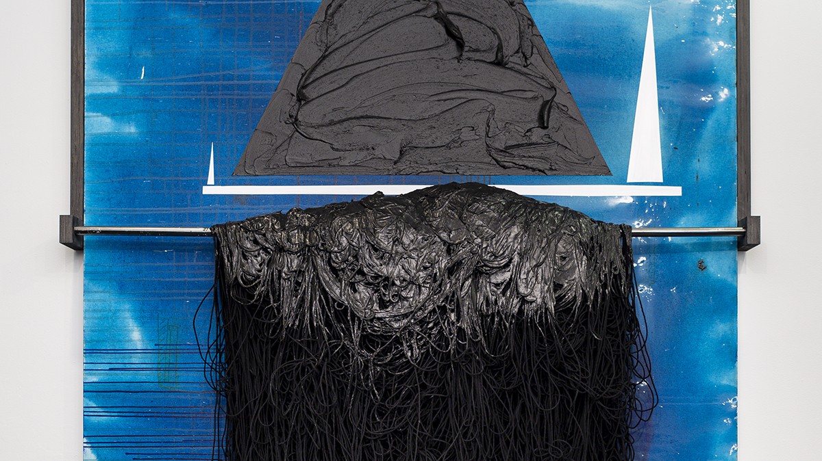 Detail of "Just Below and Just Above," acrylic, graphite, wood and ink on canvas, by Torkwase Dyson. An abstract image of black, blue and white.