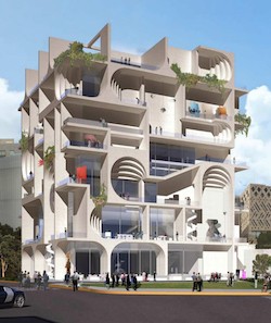 A white building with windows and outdoor balconies.