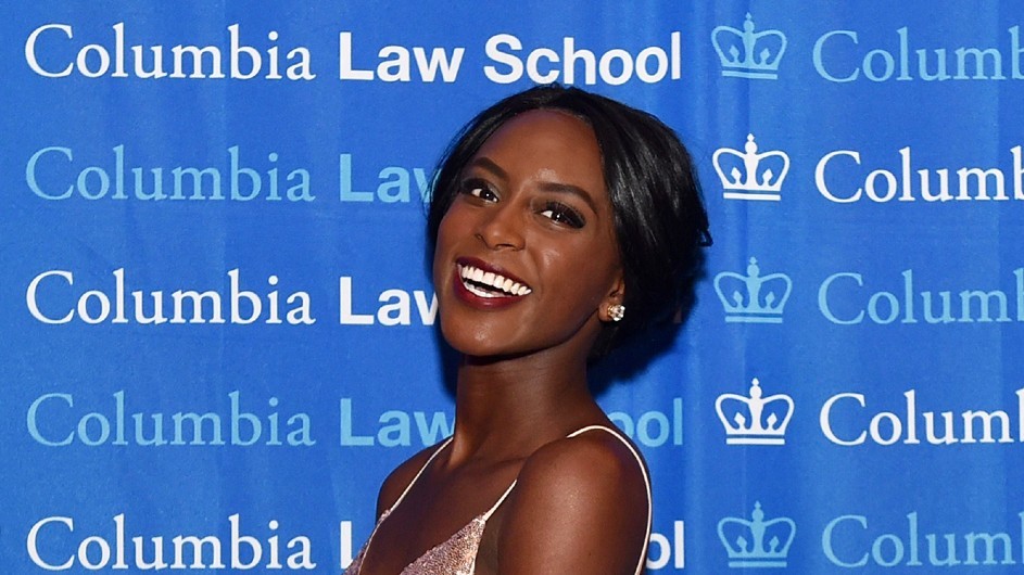 a black woman smiling