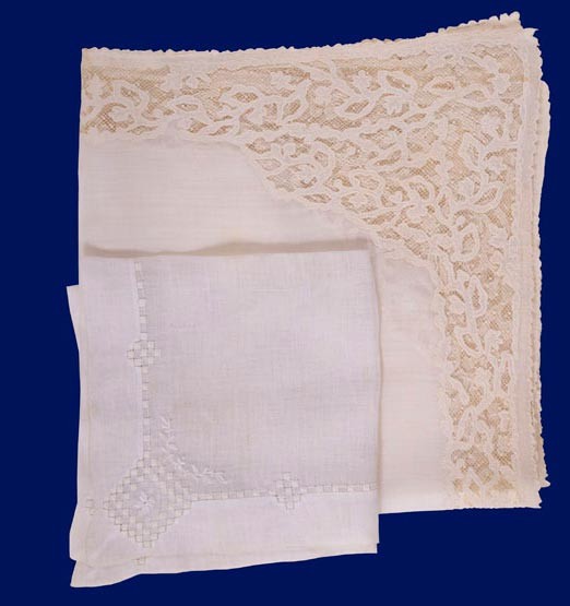 Wedding handkerchiefs of Alexander and Elizabeth Hamilton from 1780. Two white handkerchiefs on blue background