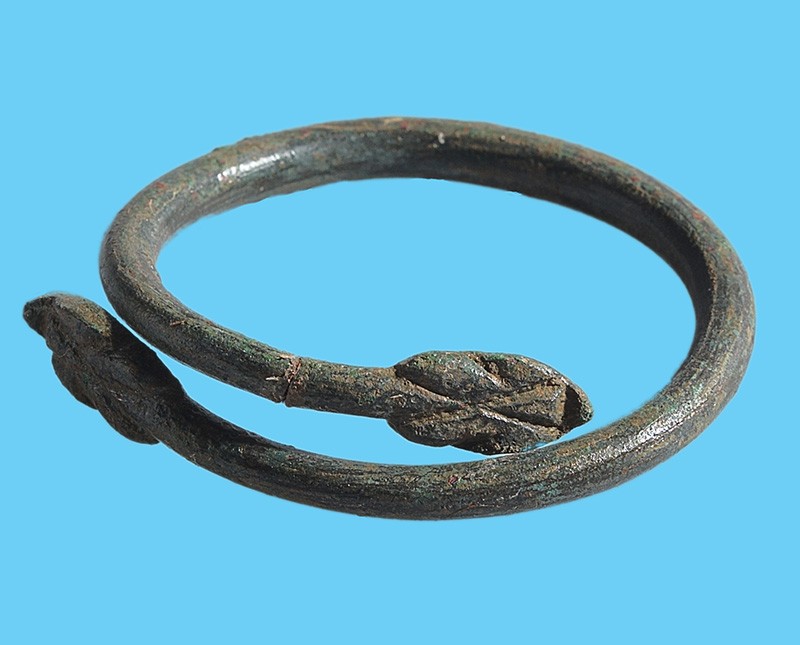 A small bronze bracelet circa 4th century BCE. Image Courtesy of © Onchestos Excavation Project Bracelet