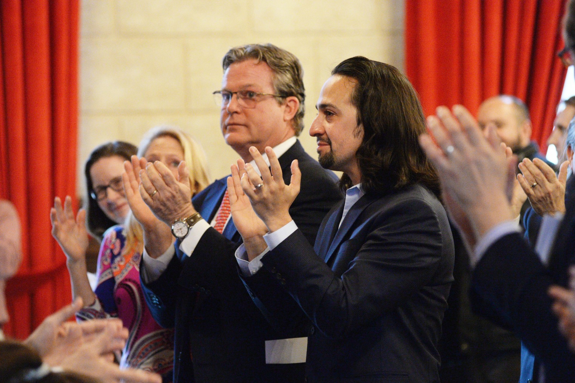 Miranda emotionally applauds after a performance by the Young People's Chorus, later stating he was touched by the Kennedy Prize ceremony. Photo by Eileen Barroso Lin-Manuel Miranda clapping in a crowd