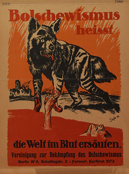 Wolf in a propaganda poster with German writing 