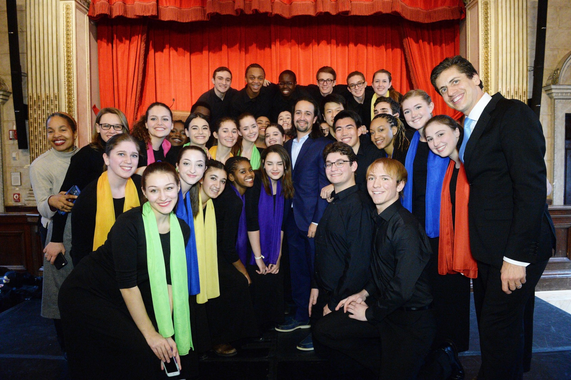 A group of young students with Lin-Manuel Miranda