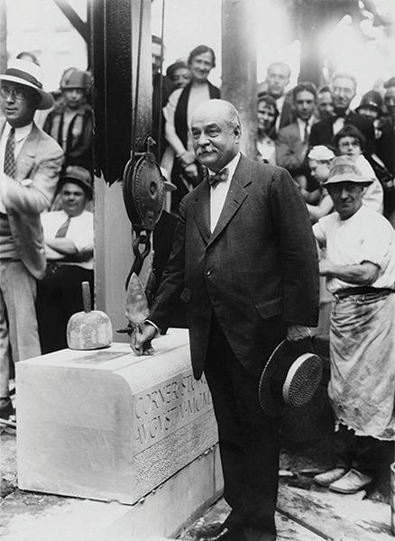 Man setting a corner stone 