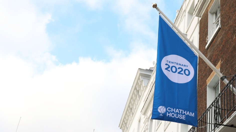 A blue and white flag with centenary 2020 written on it