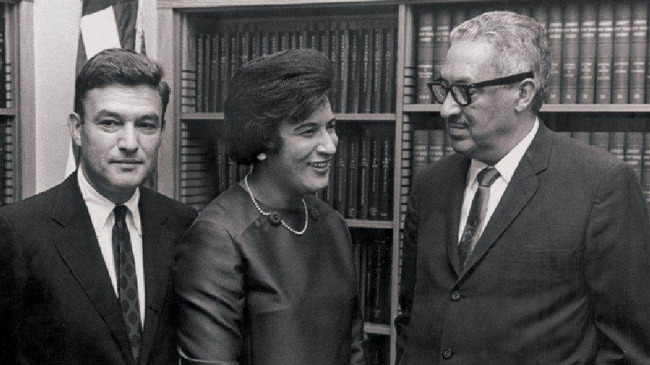Photo courtesy of NAACP Legal Defense and Education Fund Black and white photo showing a woman in between two men