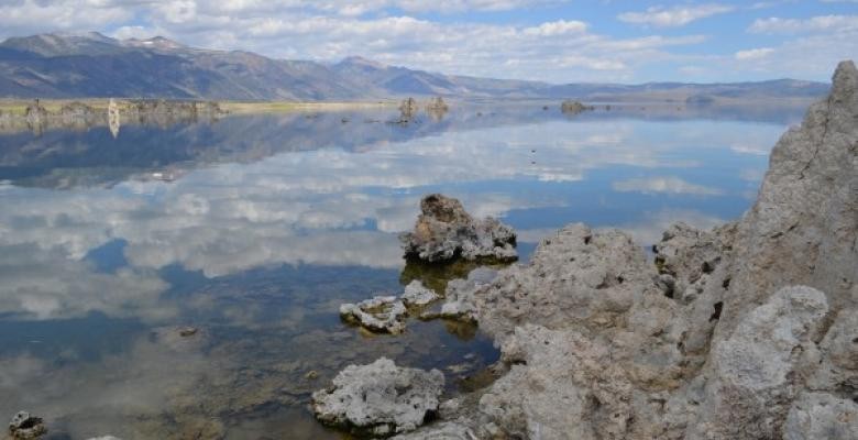 A lake with clouds reflected in its surface