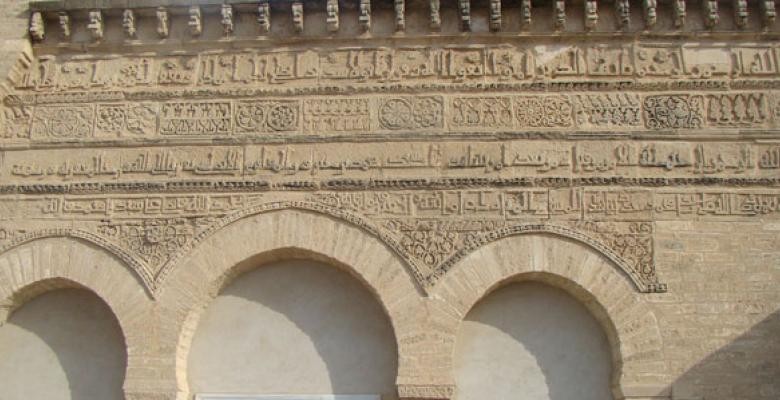 Islamic art raises questions about the uses and meanings of ornament, the role and image of calligraphy and the nature of abstract art. Above: The Mosque of the Three Doors, Kairouan, Tunisia. 866 AD. Traditionally said to have been erected by Muhammad Ibn Khayrun, a merchant from Al-Andalus. Stone archways