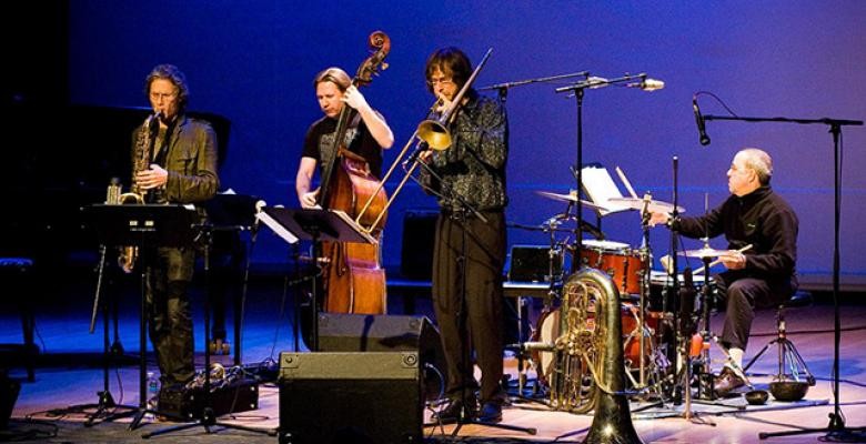 Chris Washburne plays trombone, Tony Moreno, drums, Ole Mathisen on clarinet, Per Mathisen on bass at Miller Theater. Photo by Lena Adasheva, Courtesy of Chris Washburne. Band playing on stage