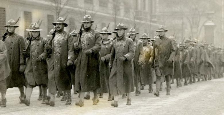 Columbia trained soldiers in war photography as part of the United States School of Military Cinematography. Photo Courtesy of Columbia University Archives Soldiers marching in a column