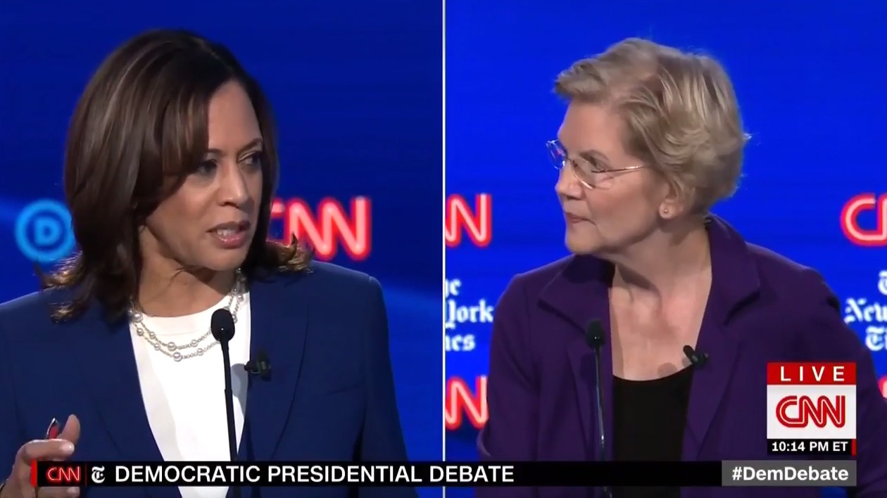 Kamala Harris and Elizabeth Warren faced off on the issue of big tech at the Democratic debate on October 15, 2019. Split video screen from CNN of two women on either side.
