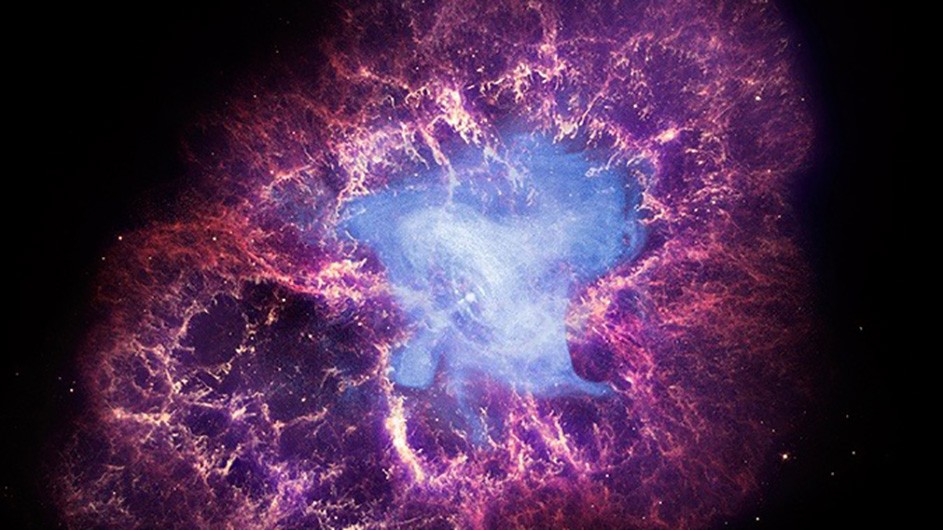 A nebula of exploding colors of light blue, pink, purple, and violet.