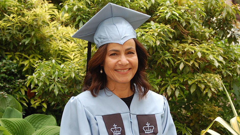 Rachel Ticotin in a Columbia blue cap and gown.