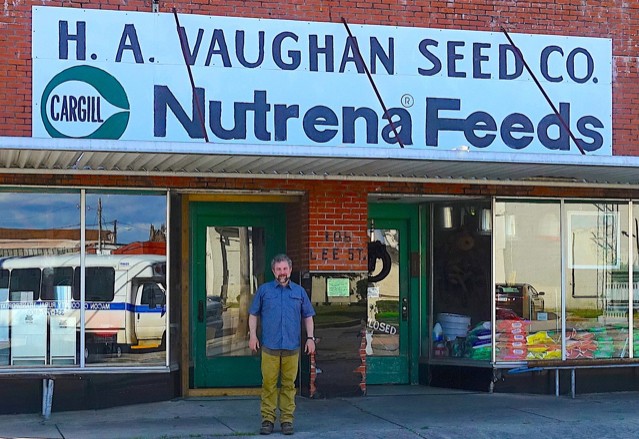 J. Thomas Vaughan in front of his grandmother's seed store