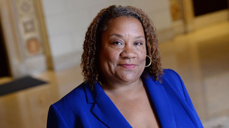 Dana Canedy, outgoing administrator of the Pulitzer Prizes. Photo credit: Eileen Barroso Dana Canedy in a blue jacket looking at the camera