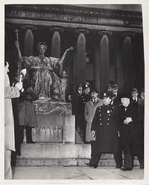 Winston Churchill (right) smokes a cigar as he passes Alma Mater after receiving an honorary doctor of laws degree on March 18, 1946. Winston Churchill