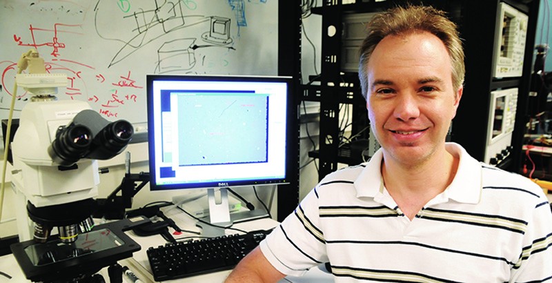 Ken Shepard in front of a computer