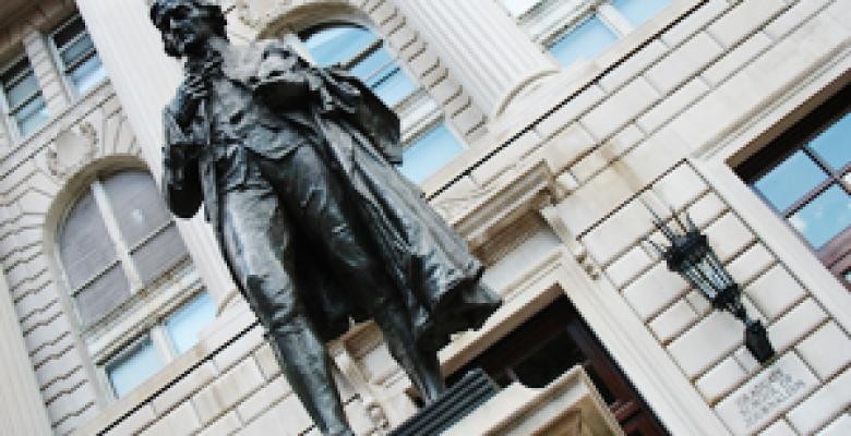 The Journalism building will be renamed "Pulitzer Hall." Thomas Jefferson statue in front of a white building